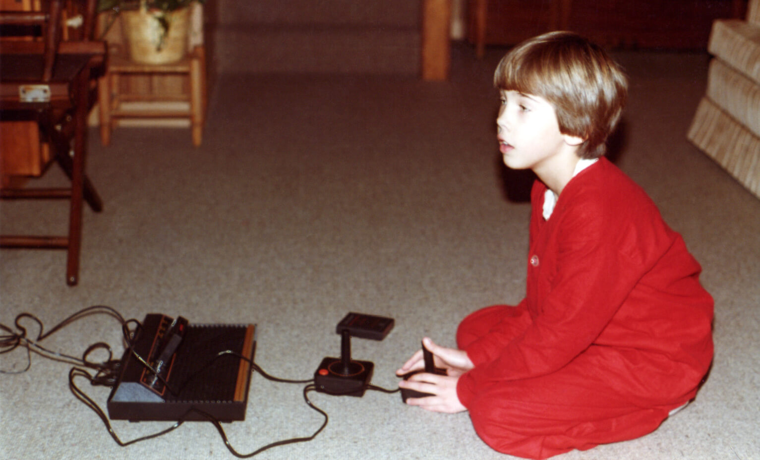 Playing my new Atari 2600 on Christmas morning, 1980.